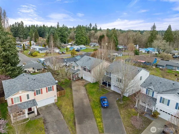 an aerial view of a house with a garden