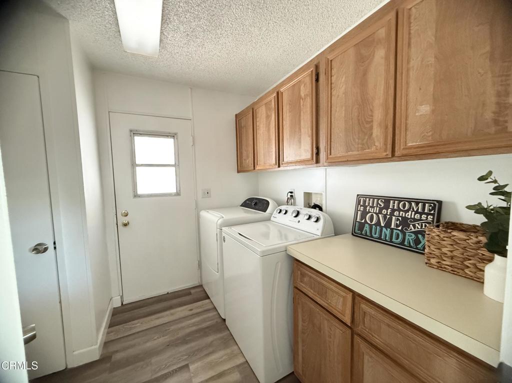 75 Copland Circle, Unit 75 Ventura, CA 93003 - Photo 11 of 22 a utility room with dryer and washer