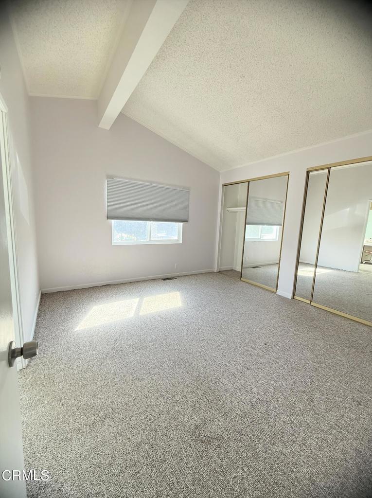 75 Copland Circle, Unit 75 Ventura, CA 93003 - Photo 12 of 22 an empty room with a empty space and windows