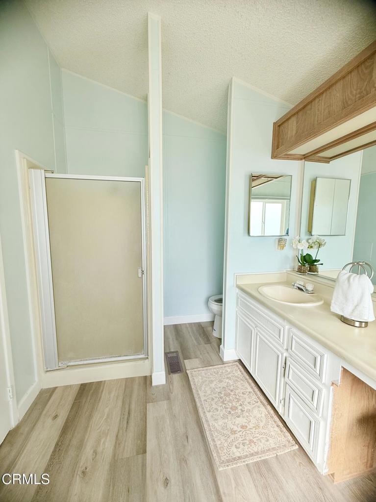 75 Copland Circle, Unit 75 Ventura, CA 93003 - Photo 14 of 22 a bathroom with a sink and a mirror