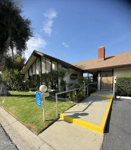 a view of swimming pool with a patio