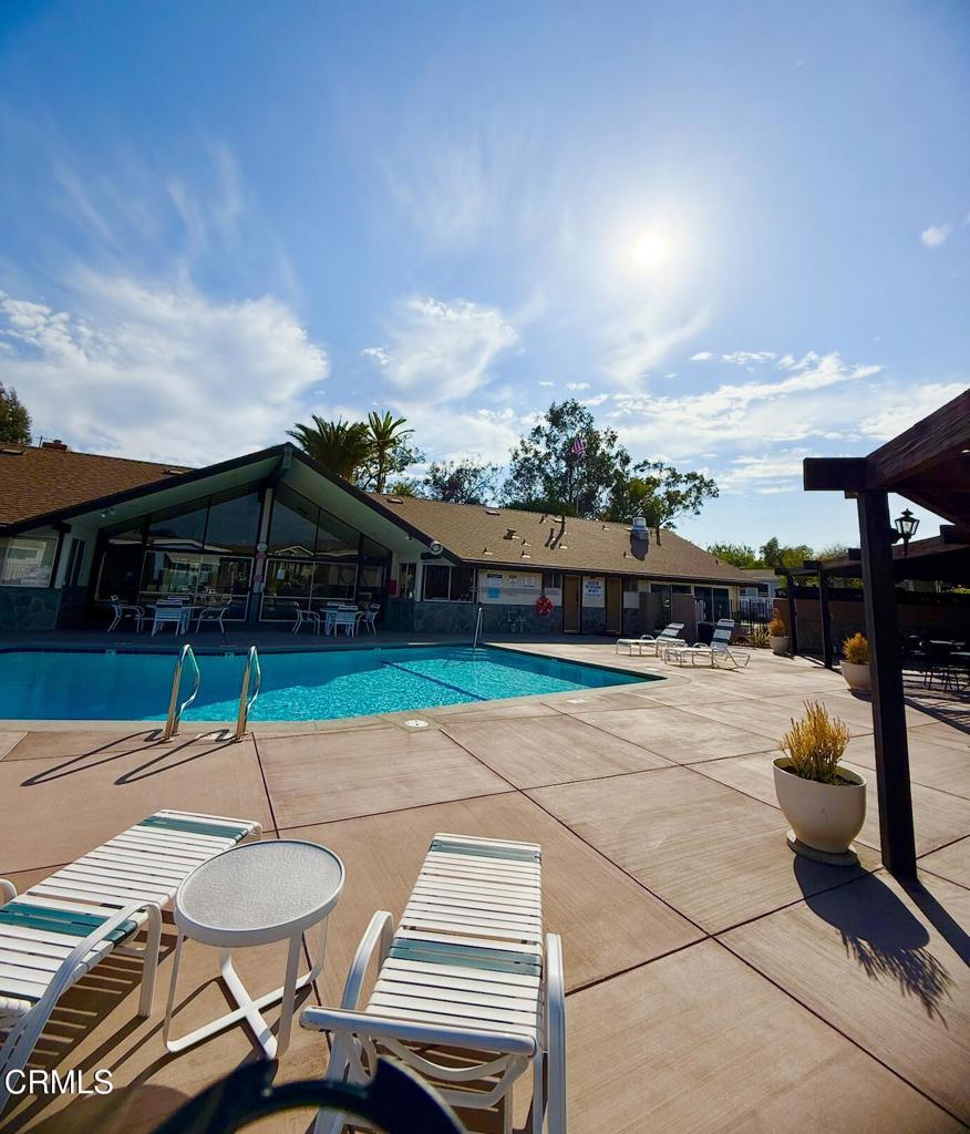 75 Copland Circle, Unit 75 Ventura, CA 93003 - Photo 18 of 22 a swimming pool with barbeque oven in front of it