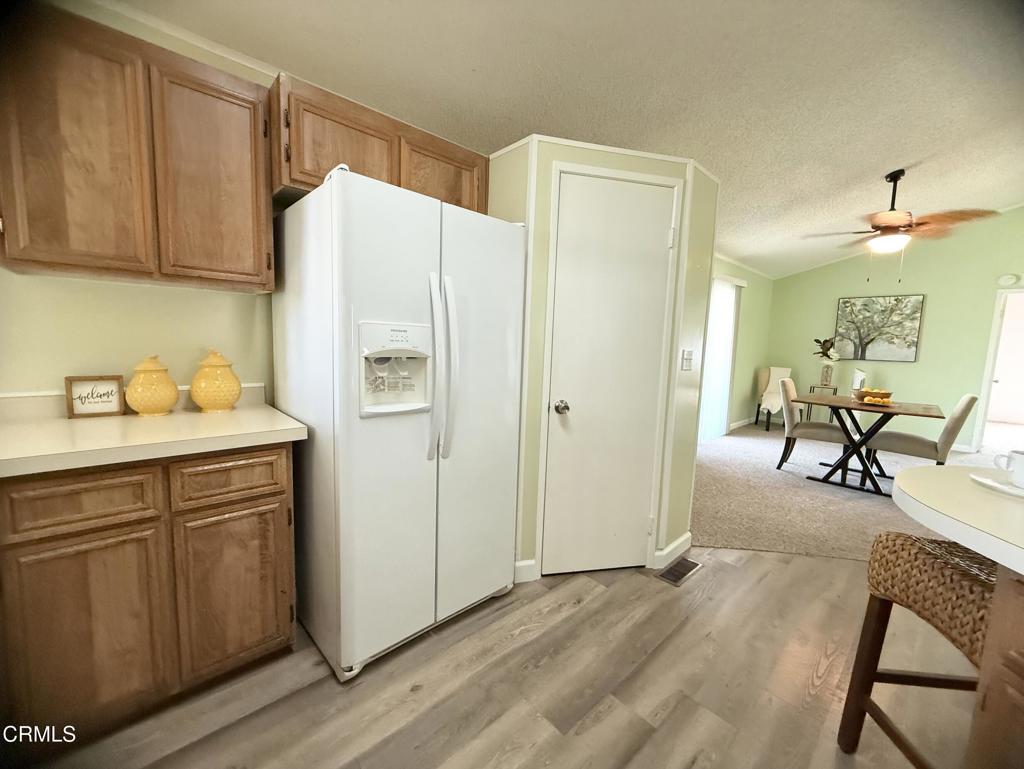 75 Copland Circle, Unit 75 Ventura, CA 93003 - Photo 7 of 22 a kitchen with a refrigerator and a sink