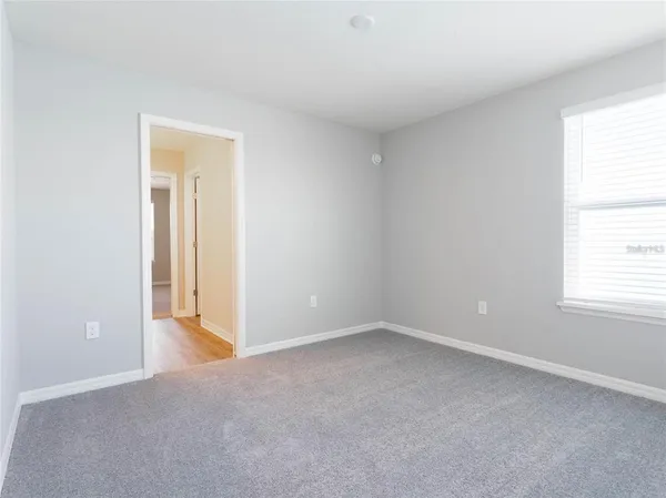 an empty room with a window