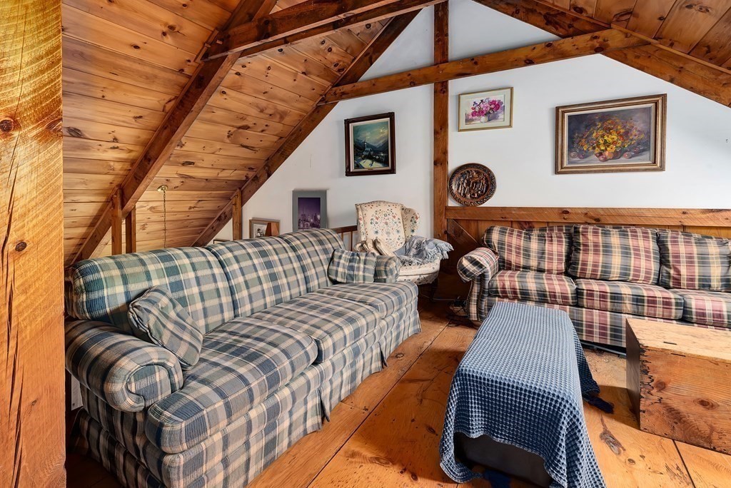 357 Ipswich Road Boxford, MA 01921 - Photo 15 of 28 a bedroom with bed and a wall painting