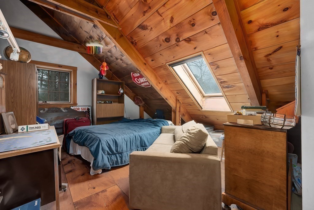 357 Ipswich Road Boxford, MA 01921 - Photo 17 of 28 a living room with furniture and a flat screen tv