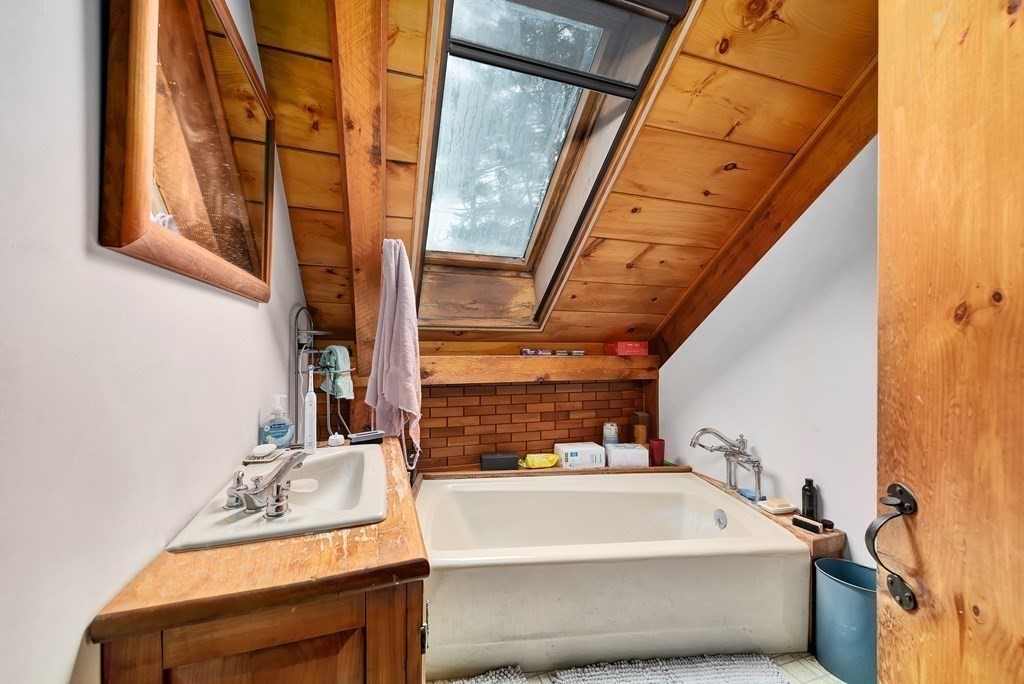 357 Ipswich Road Boxford, MA 01921 - Photo 18 of 28 a bathroom with a bathtub and shower