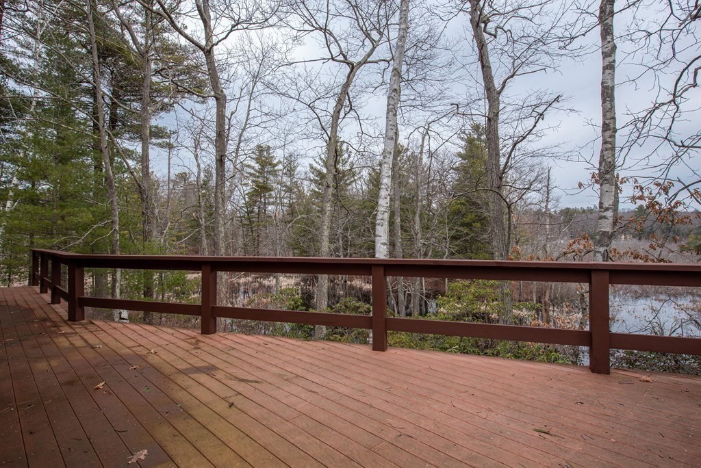 357 Ipswich Road Boxford, MA 01921 - Photo 20 of 28 a view of outdoor space with wooden deck and trees