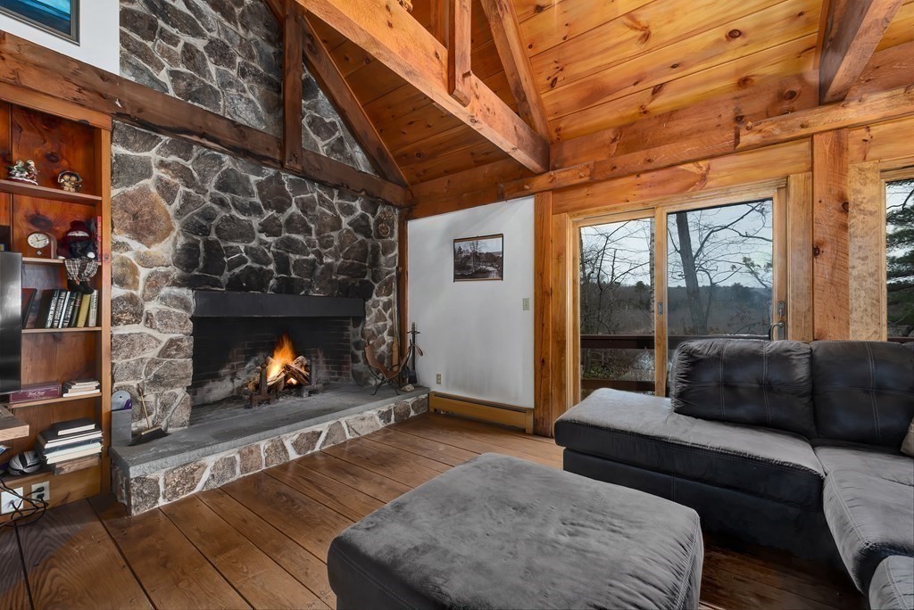 357 Ipswich Road Boxford, MA 01921 - Photo 5 of 28 a living room with furniture and a fireplace