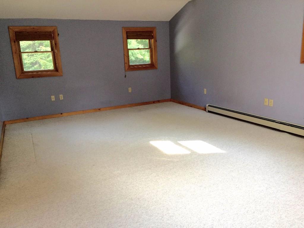 884 Tremont Road Bernard, ME 04612 - Photo 14 of 24 Large second floor bedroom.
