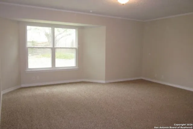 an empty room with a window