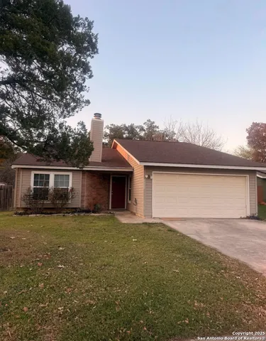 a house with garden in front of it