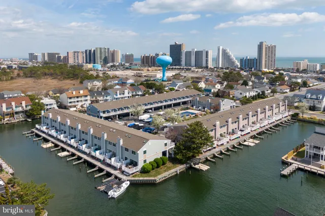 a view of a city with a lake