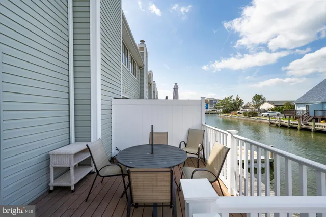 a view of a chairs on the deck