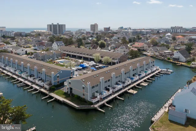 a view of a city with a lake