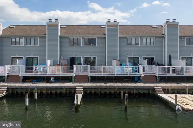 a view of building with river in background