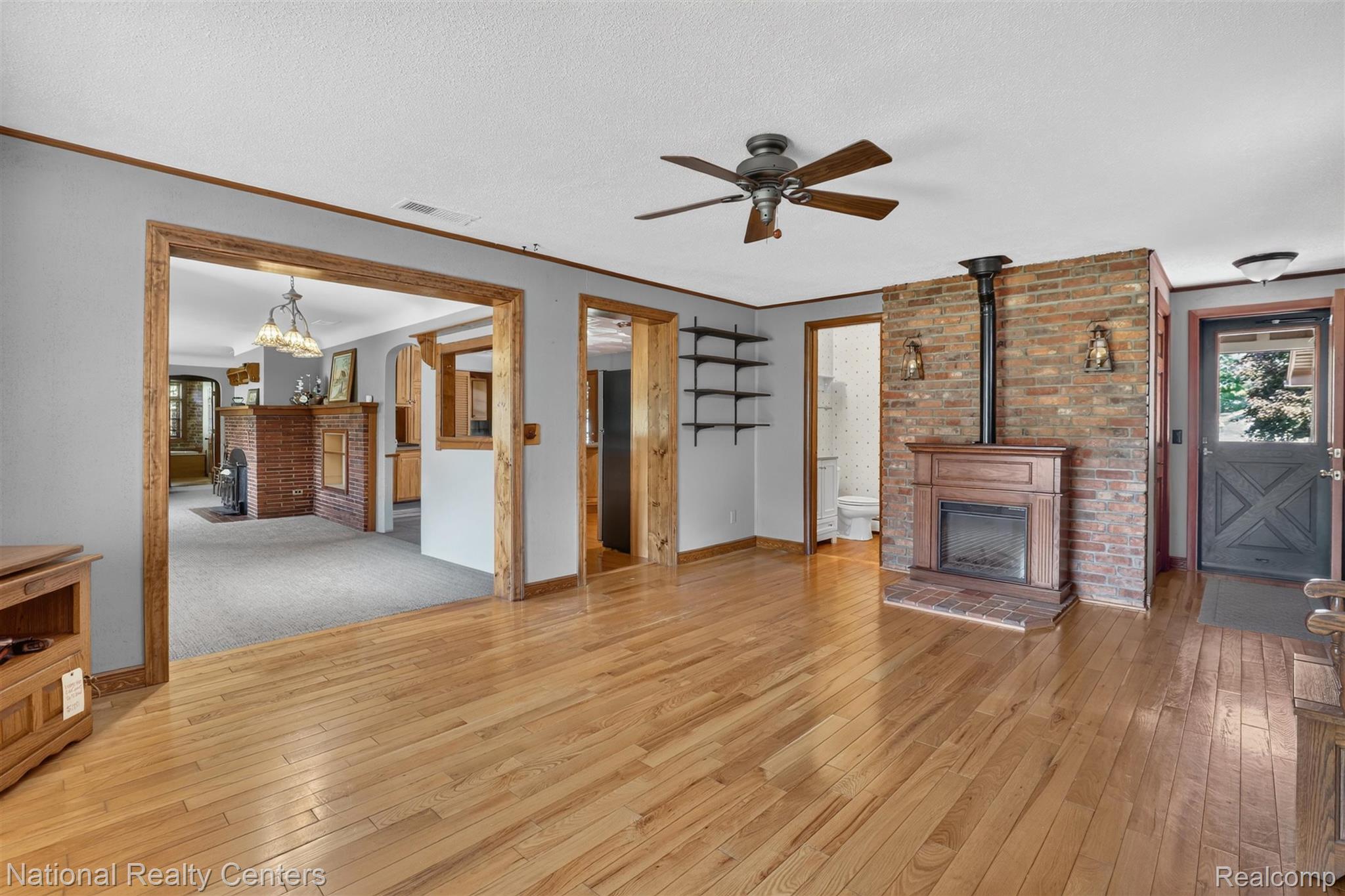 127 West Albain Road Petersburg, MI 49270 - Photo 14 of 61 Hardwood flooring throughout the main living area
