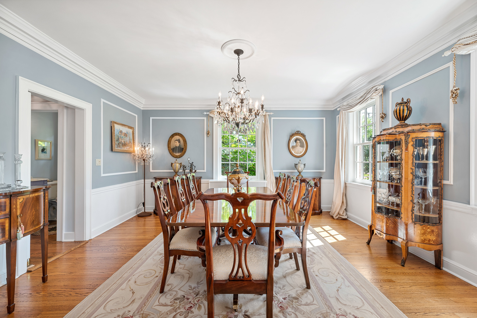 611 County Line Road Highland Park, IL 60035 - Photo 12 of 49 a view of a dining room with furniture window and wooden floor