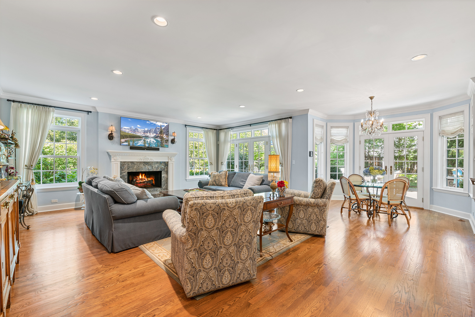 611 County Line Road Highland Park, IL 60035 - Photo 14 of 49 a living room with furniture a fireplace and a large window