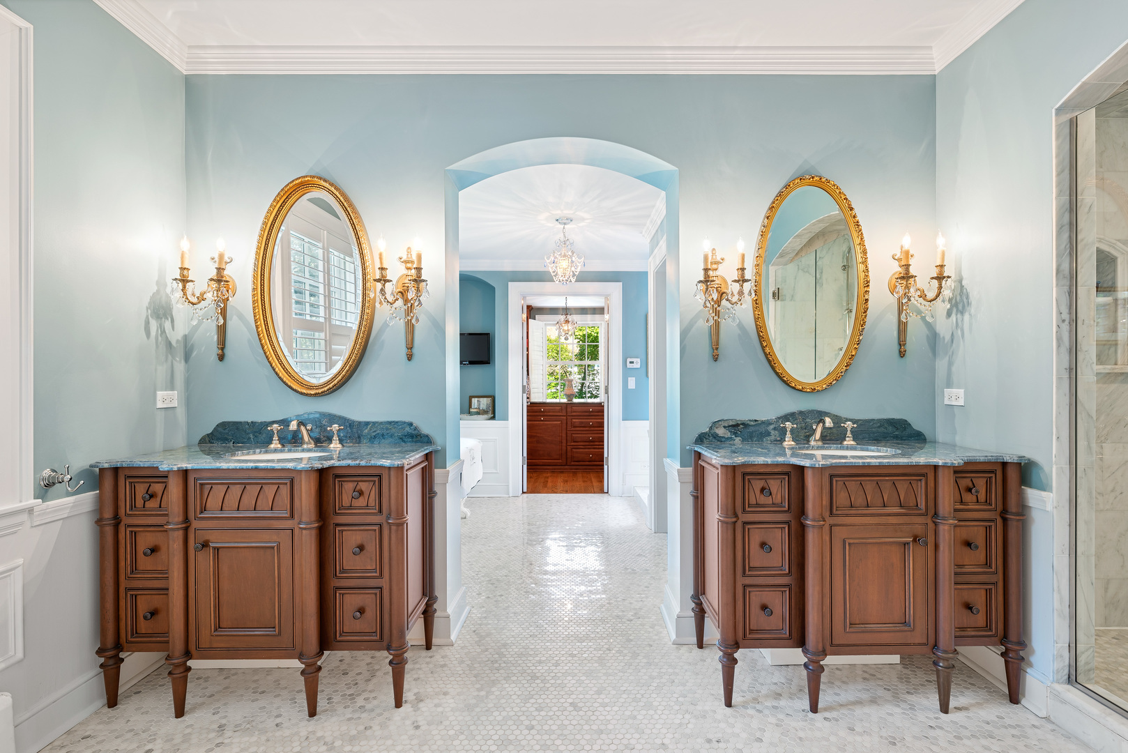 611 County Line Road Highland Park, IL 60035 - Photo 26 of 49 a view of a bathroom with a sink and a mirror
