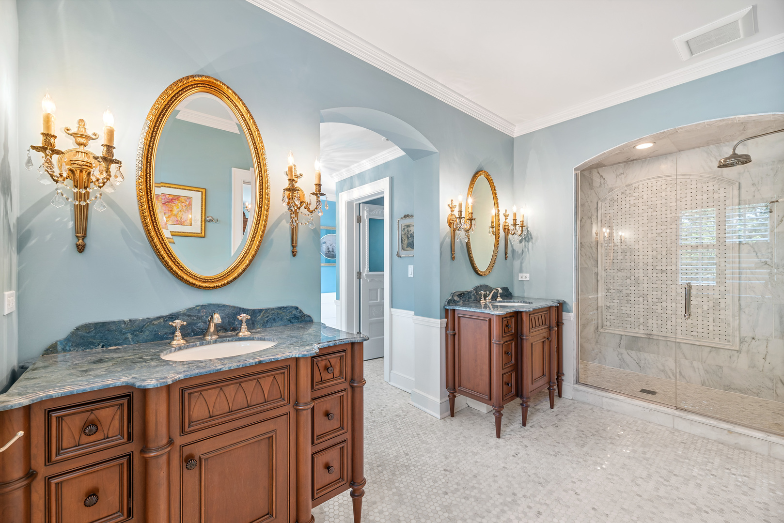 611 County Line Road Highland Park, IL 60035 - Photo 29 of 49 a bathroom with a mirror double vanity sink and a mirror