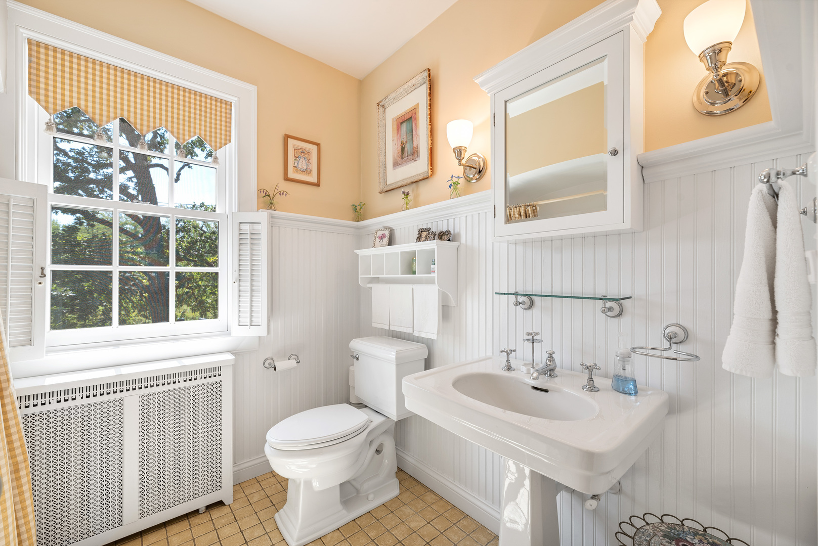 611 County Line Road Highland Park, IL 60035 - Photo 33 of 49 a bathroom with a sink a toilet and a mirror