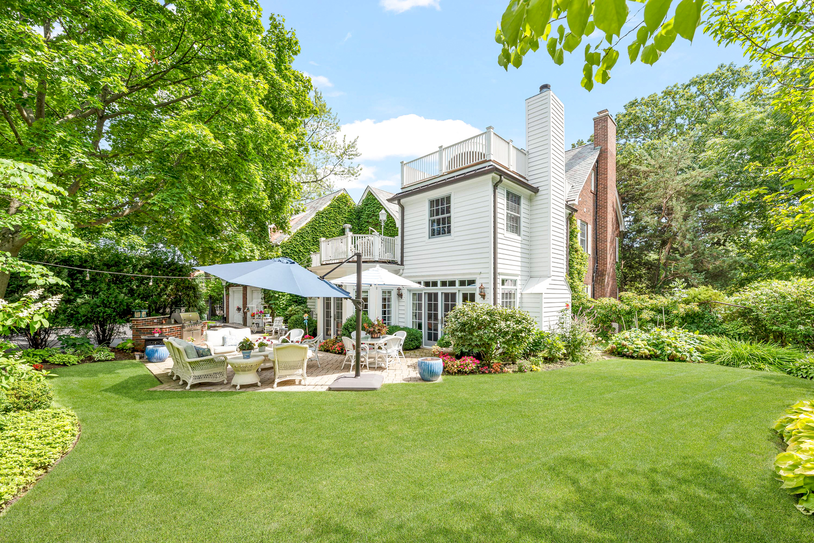 611 County Line Road Highland Park, IL 60035 - Photo 45 of 49 a front view of a house with garden