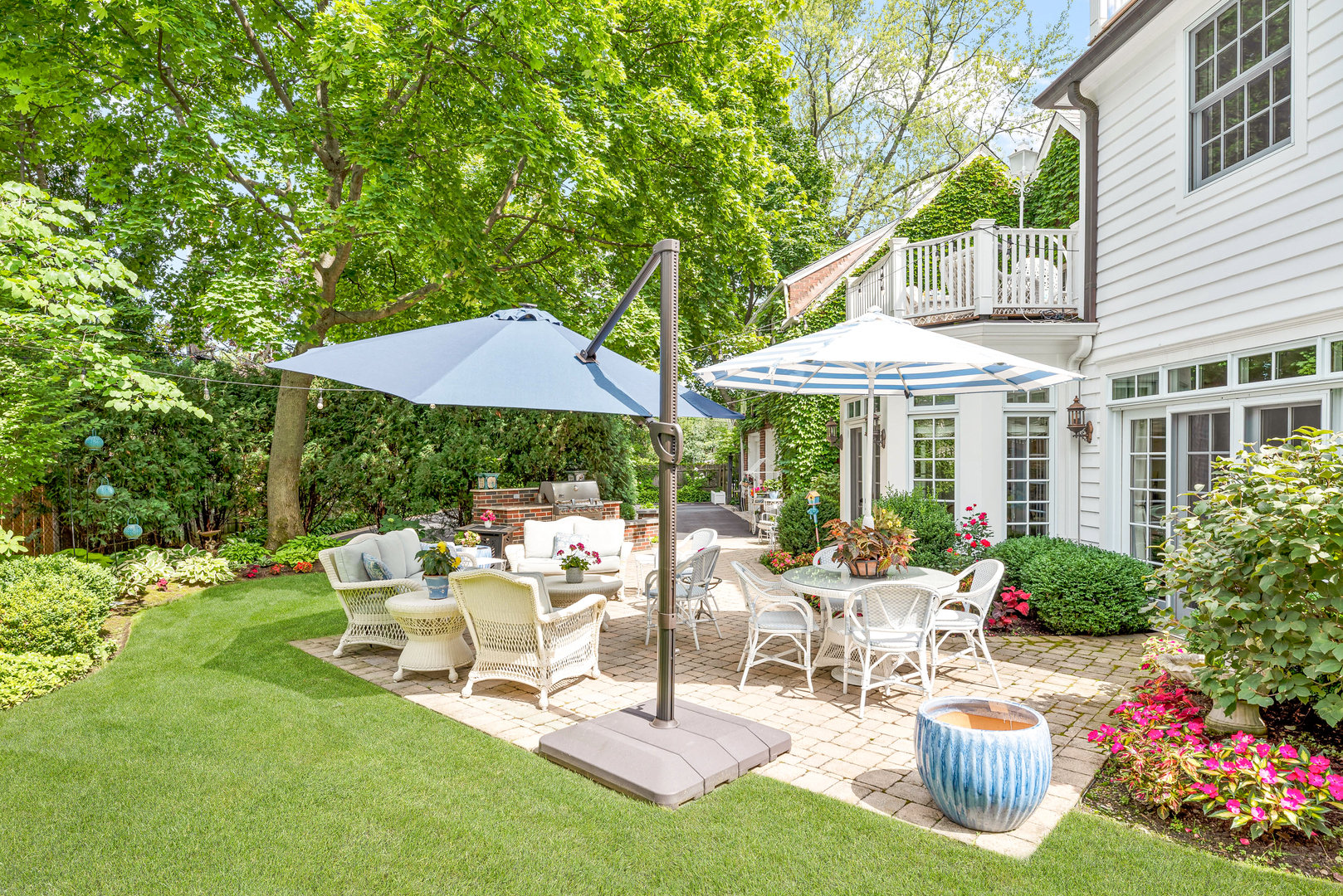 611 County Line Road Highland Park, IL 60035 - Photo 46 of 49 a view of a patio with table and chairs under an umbrella