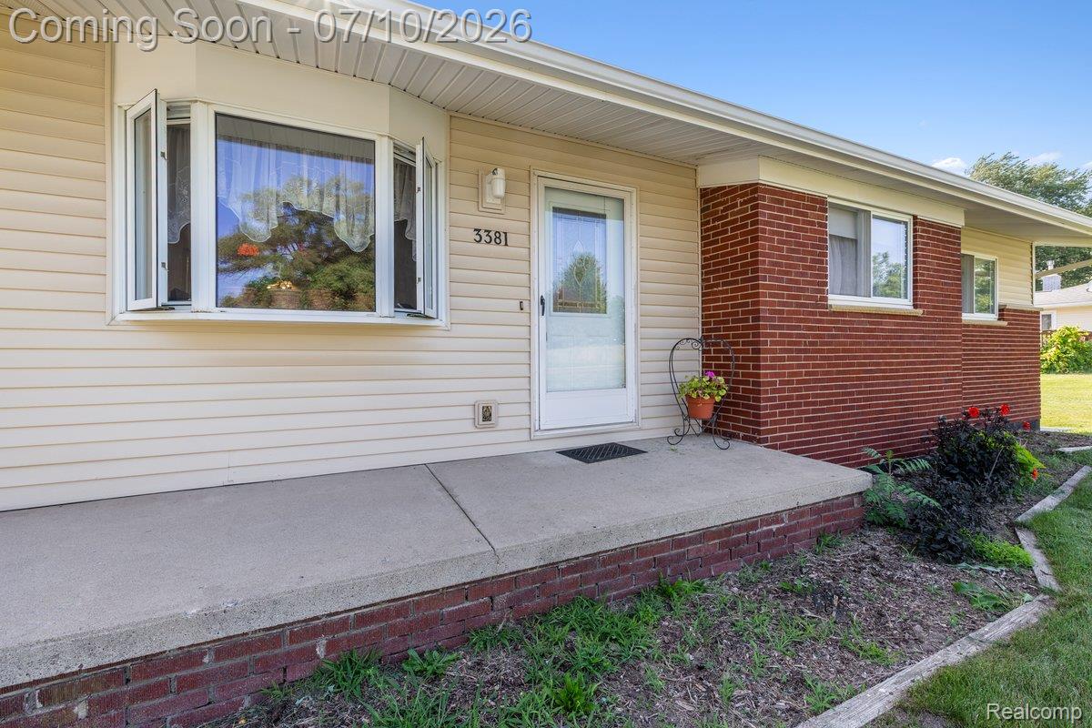 3381 North Fleming Road Fowlerville, MI 48836 - Photo 2 of 29 Nice front porch to relax on or welcome visitors