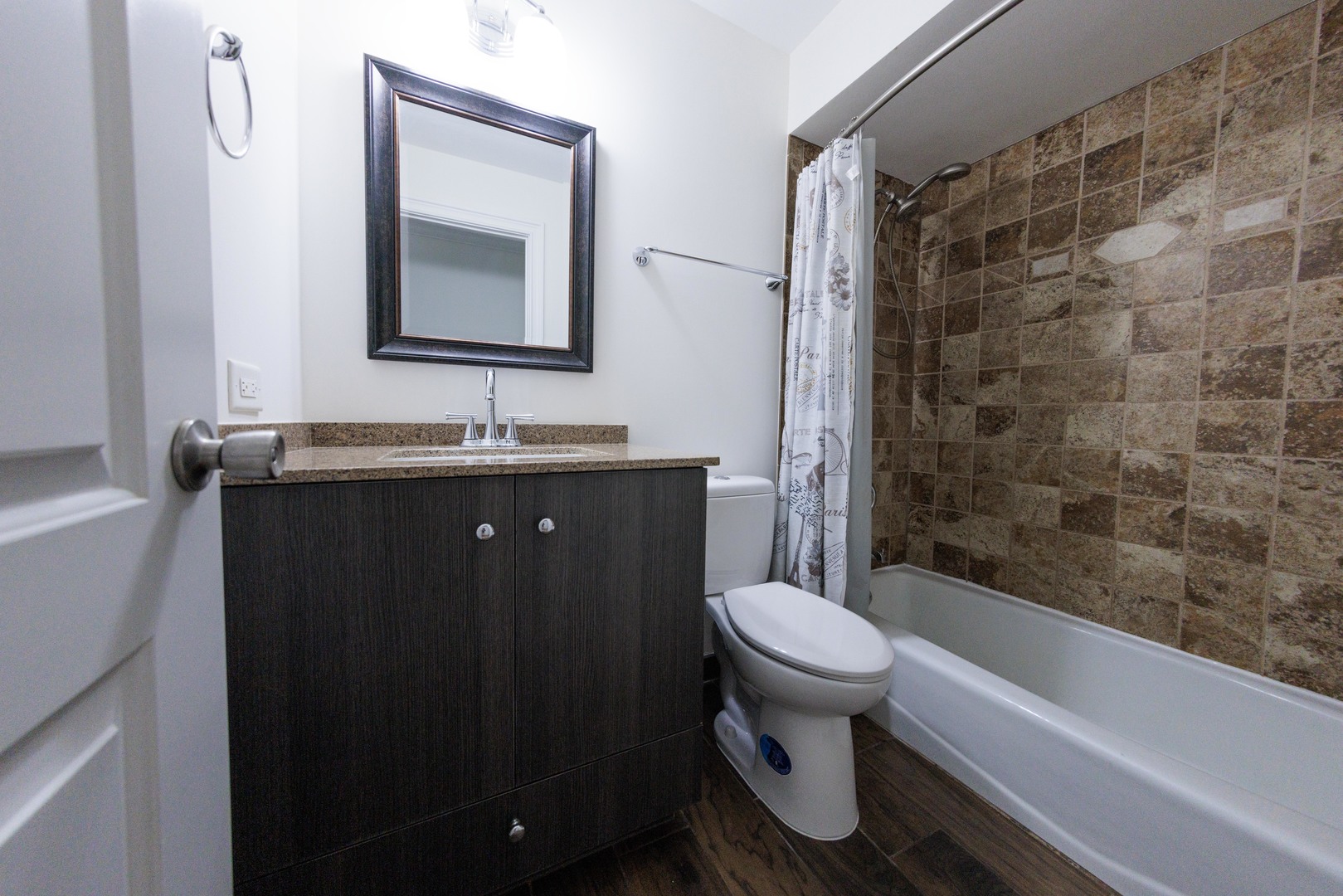 5 Echo Court, Unit 12 Vernon Hills, IL 60061 - Photo 12 of 14 a bathroom with a sink toilet and shower