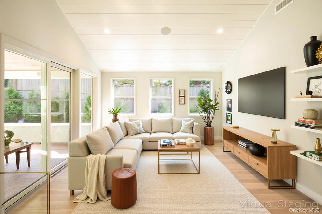 195 Little Fresh Pond Road Southampton, NY 11968 - Photo 21 of 40 Living room with light wood finished floors, vaulted ceiling, recessed lighting, and wood ceiling