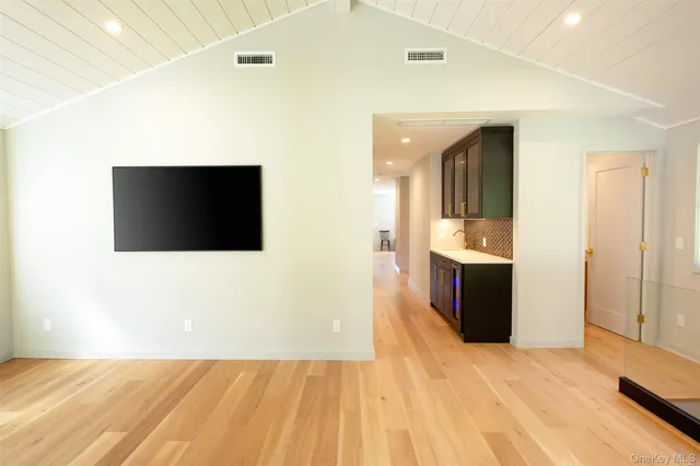 a view of a livingroom with a flat screen tv