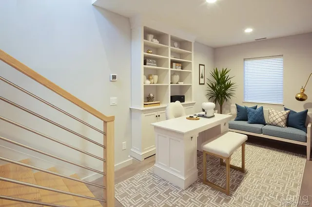 a living room with a couch and a table