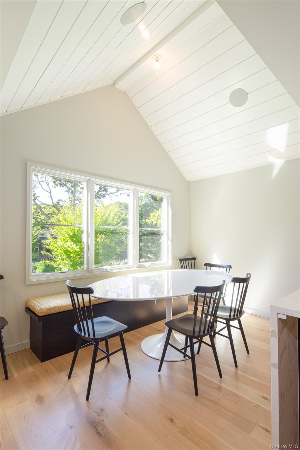 195 Little Fresh Pond Road Southampton, NY 11968 - Photo 5 of 40 Dining room with light wood finished floors and wood ceiling