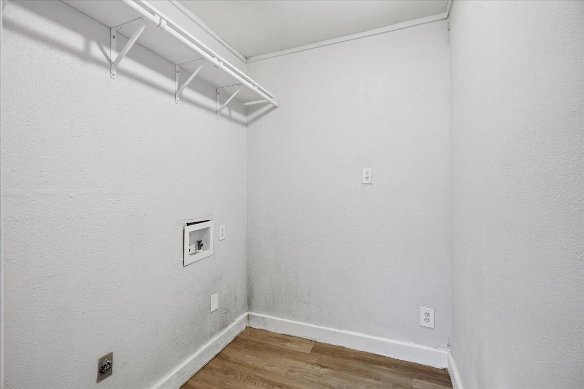 2503 30th Street Lubbock, TX 79410 - Photo 23 of 26 a view of a room with wooden floor