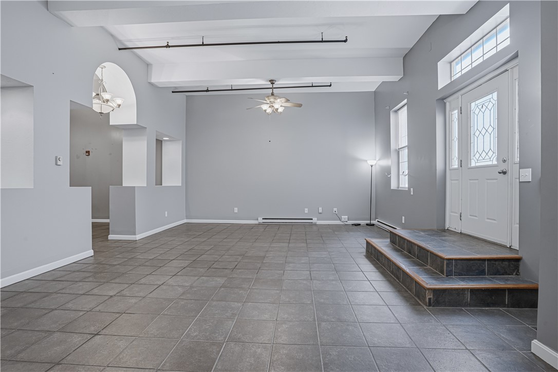 148 Bernon Street, Unit 7 Woonsocket, RI 02895 - Photo 14 of 49 Two steps down into grand living room