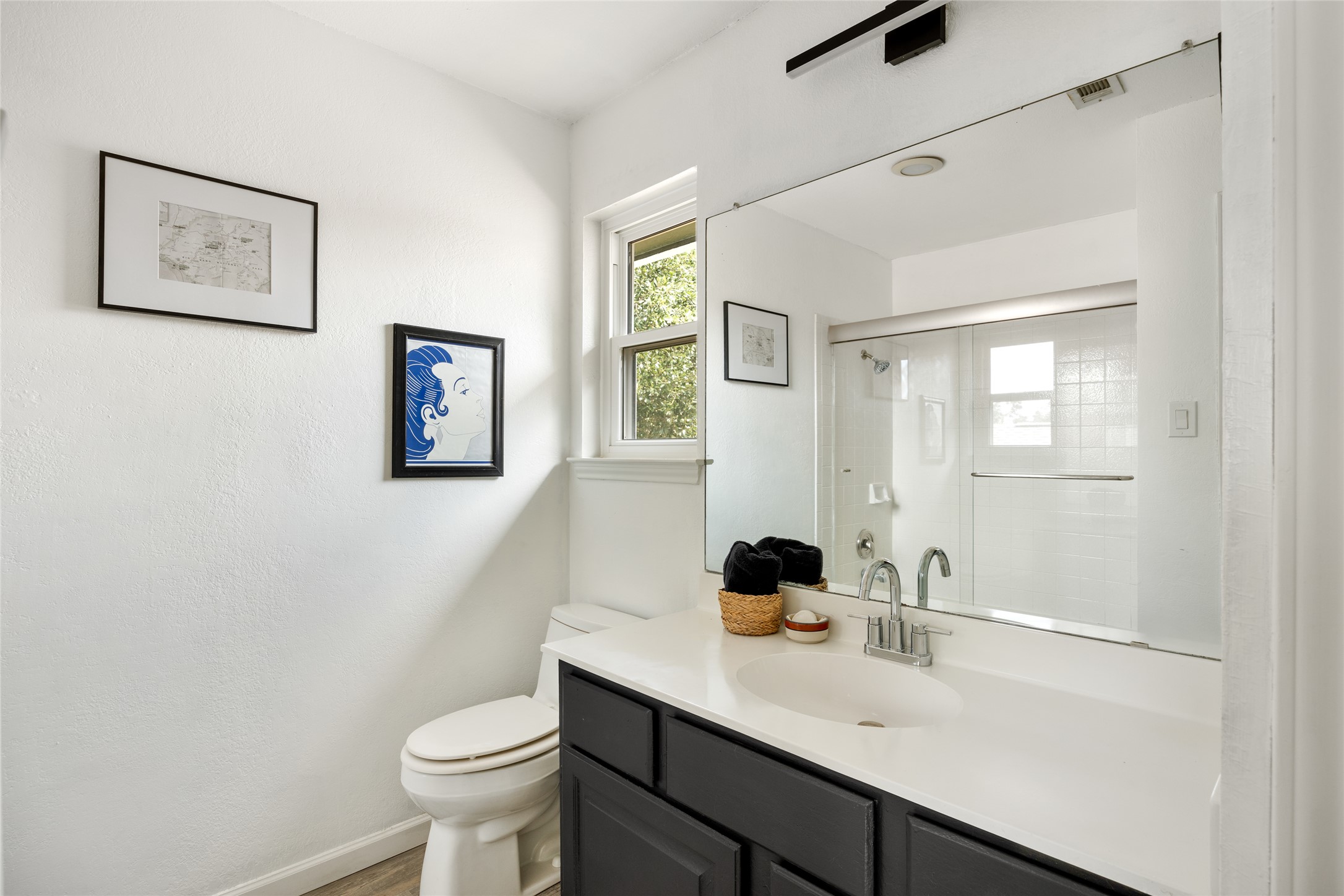 8504 Verona Trail Austin, TX 78749 - Photo 24 of 32 a bathroom with a sink a toilet and mirror
