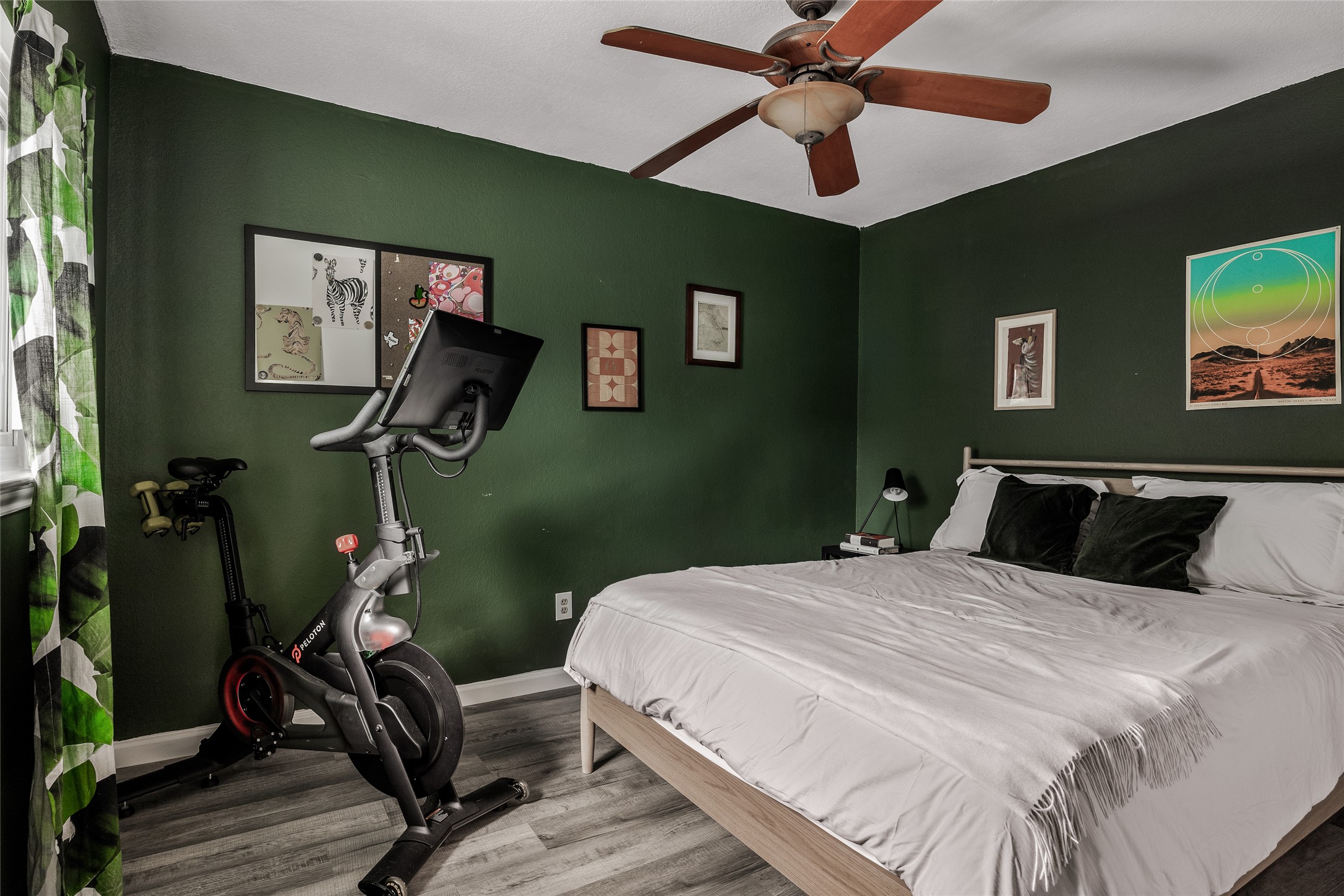 8504 Verona Trail Austin, TX 78749 - Photo 26 of 32 a bedroom with a bed and a chandelier