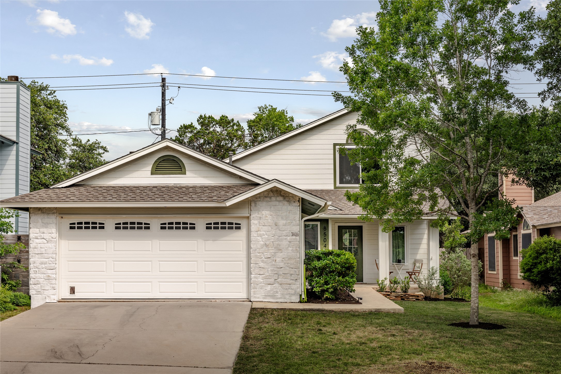 8504 Verona Trail Austin, TX 78749 - Photo 3 of 32 a front view of a house with garden