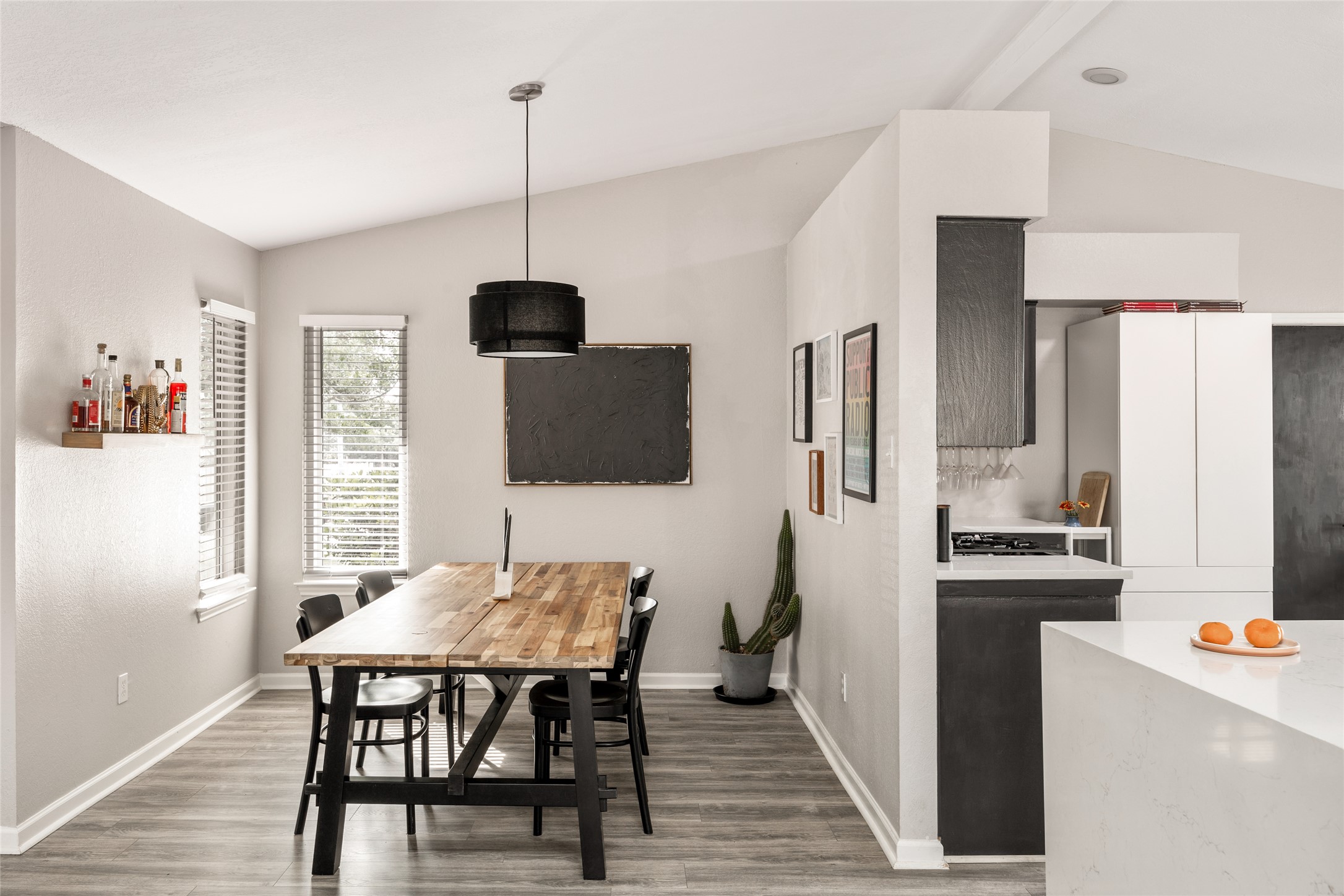 8504 Verona Trail Austin, TX 78749 - Photo 5 of 32 a view of a dining room with furniture window and wooden floor