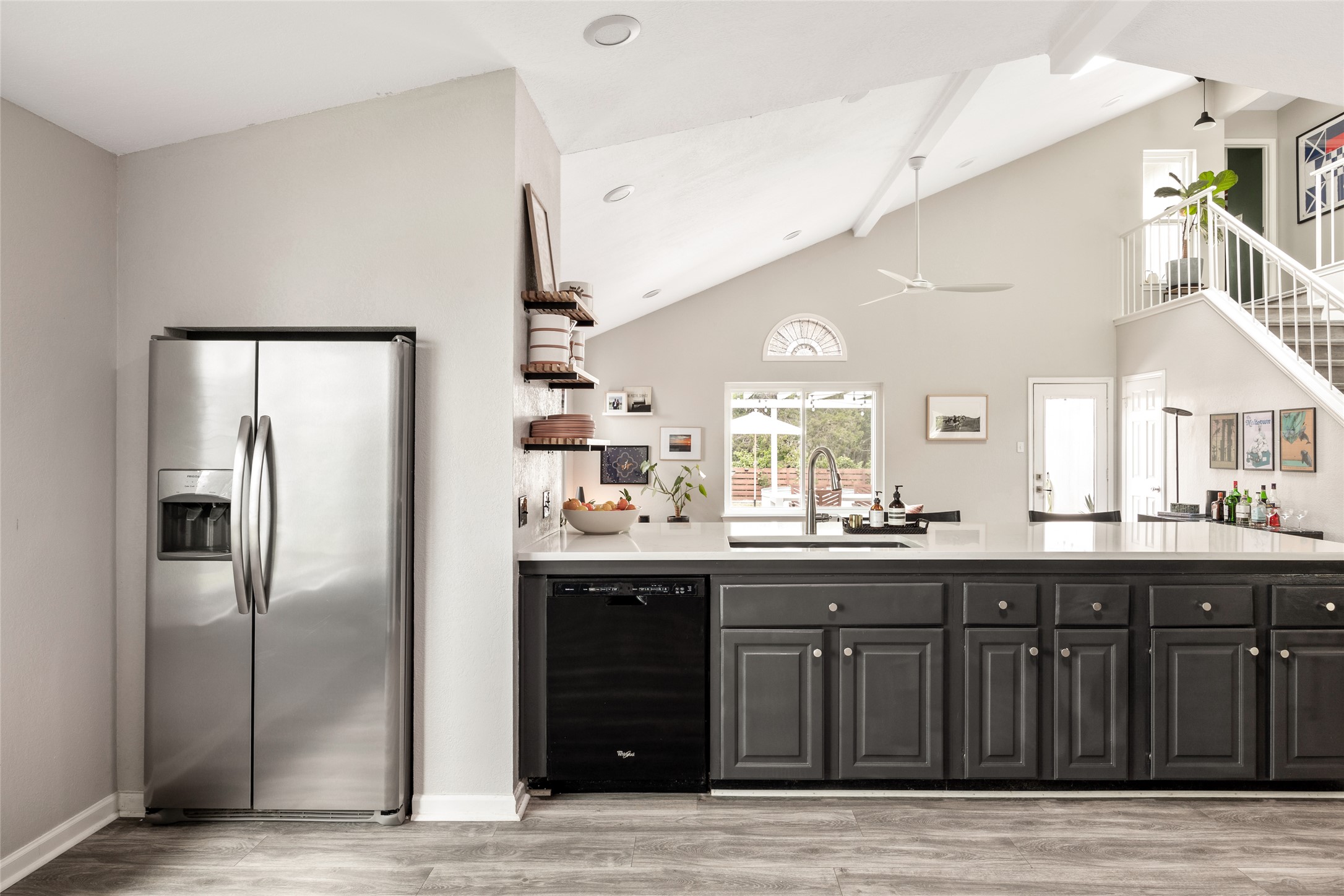 8504 Verona Trail Austin, TX 78749 - Photo 9 of 32 a kitchen with stainless steel appliances granite countertop a refrigerator and a sink