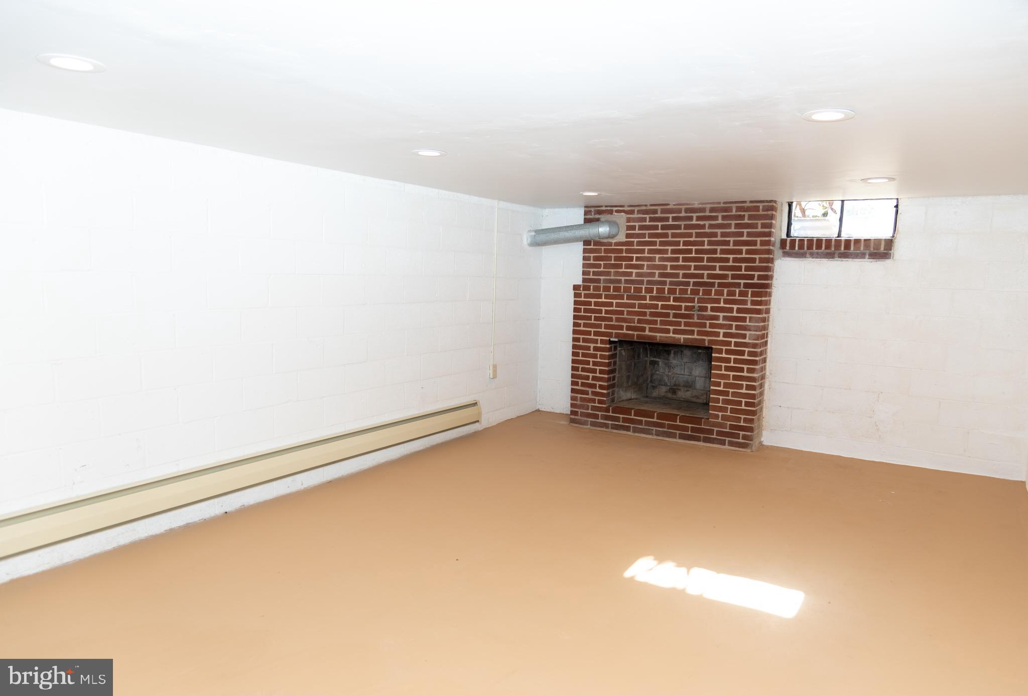 3312 Grandview Road Hanover, PA 17331 - Photo 23 of 36 Basement, brick wood-burning fireplace
