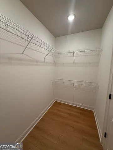 a view of a room with racks on the wall