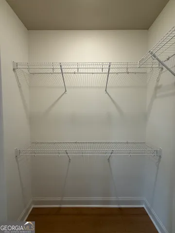 a view of a room with racks on the wall