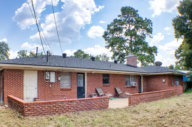 a front view of a house with patio