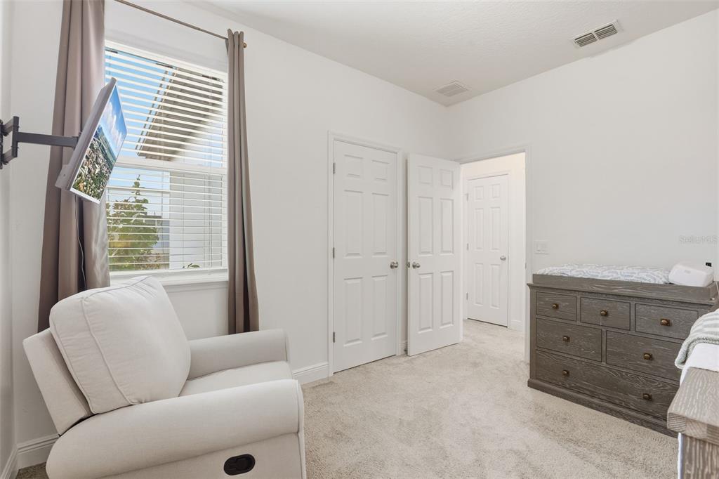 2420 Firstlight Way Winter Park, FL 32792 - Photo 22 of 48 a living room with furniture and a window