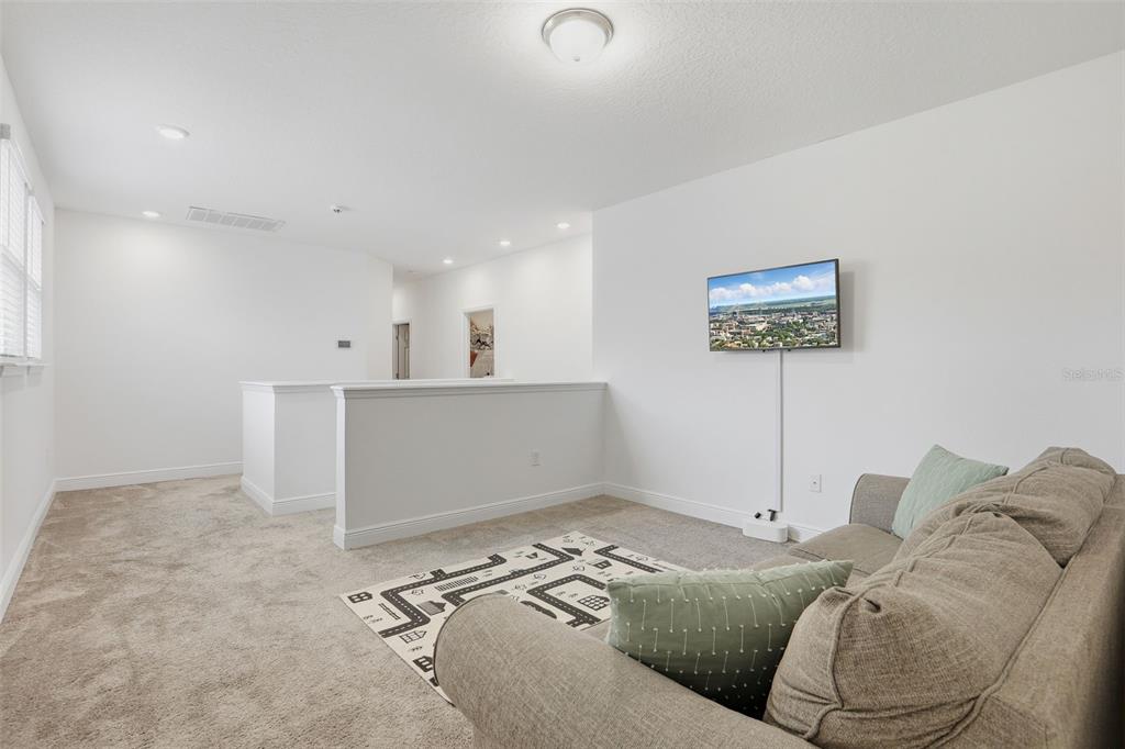 2420 Firstlight Way Winter Park, FL 32792 - Photo 28 of 48 a living room with furniture