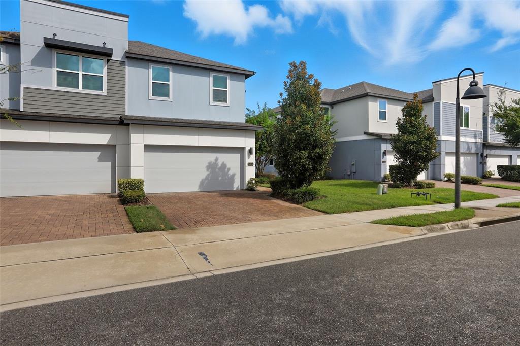 2420 Firstlight Way Winter Park, FL 32792 - Photo 31 of 48 a view of a house with a yard and plants
