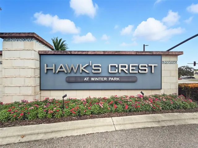 a street sign on the side of building