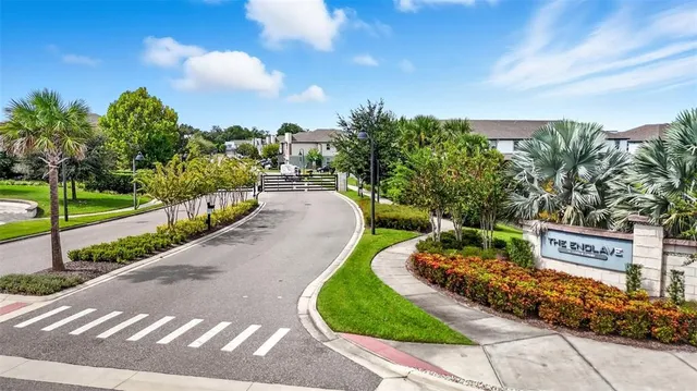 a view of a street with a building in the background